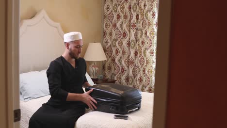 middle eastern young man ready to travel track right