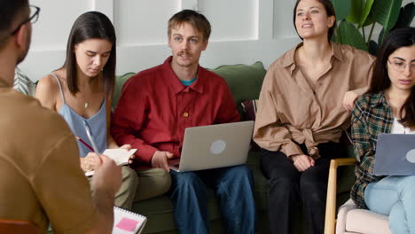 Close-Up-View-Of-Study-Group-Sitting-On-Sofa-And-Chairs-2