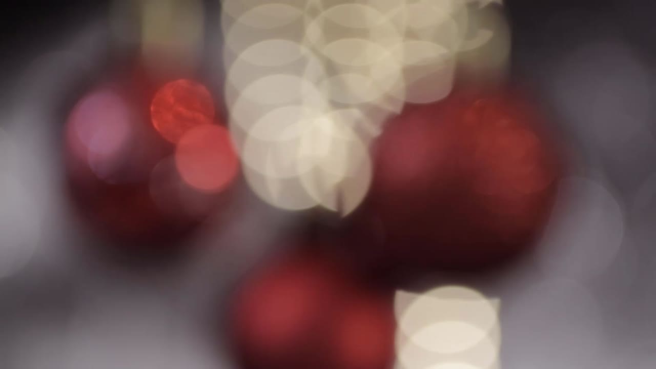 Red Christmas gold and red decorations hanging bokeh background