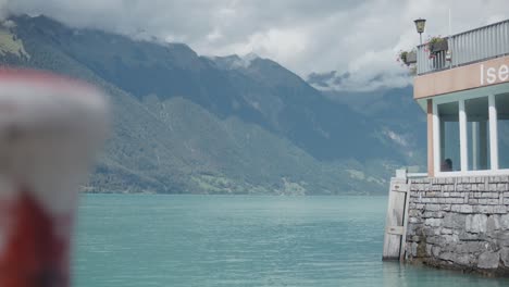 iseltwald switzerland pier view peaceful waves cloudy mountain