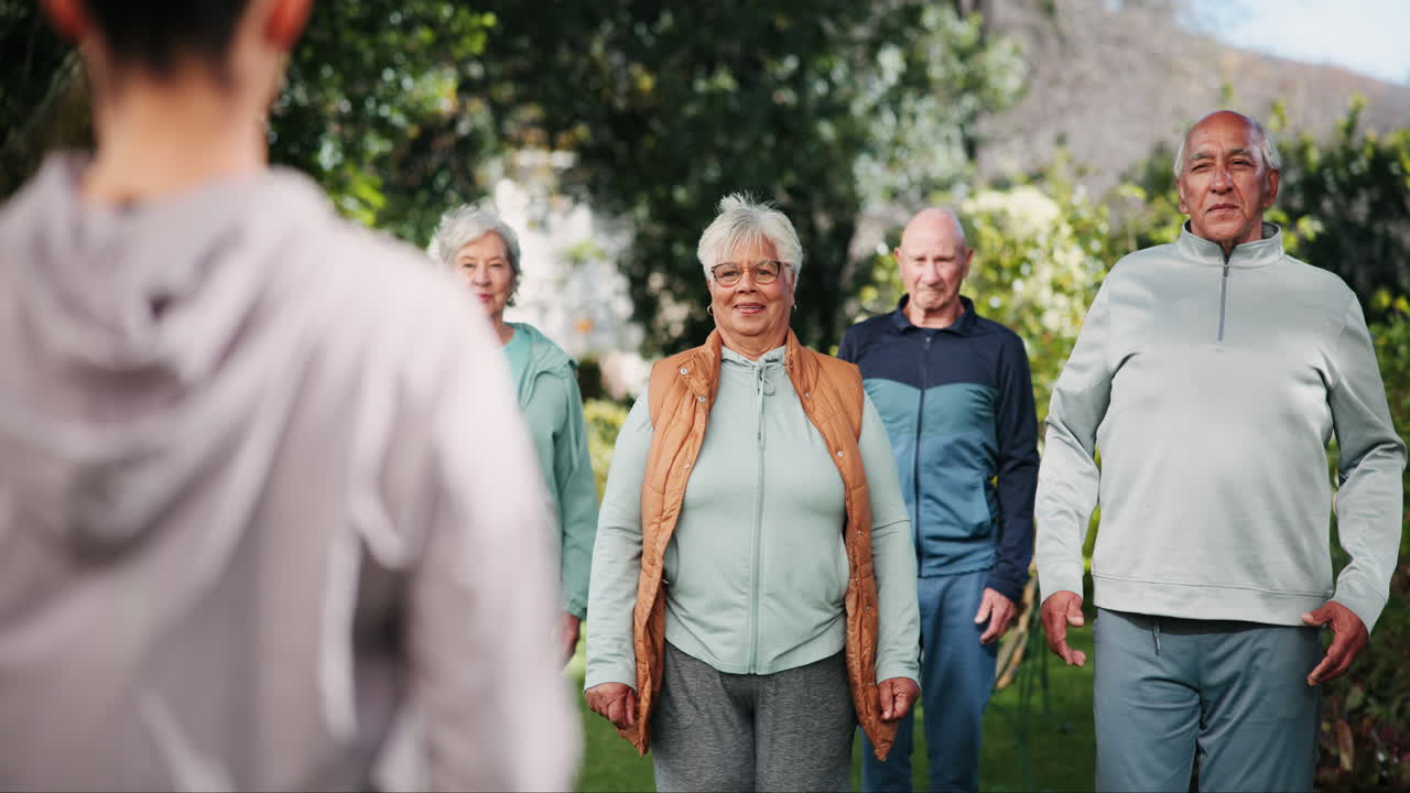 Group of older adults exercising outdoors