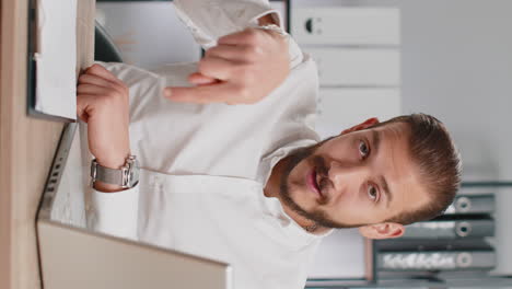 business man showing time on wrist watch clock approve pointing finger time to start work deadline