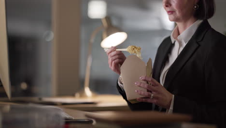 woman, night and hands eating chinese food