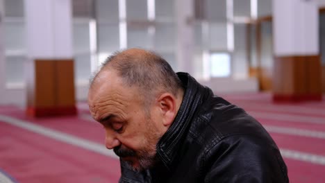 Man-Raising-His-Hands-And-Praying-In-Mosque-1