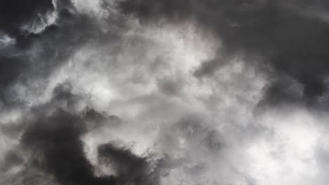 dramatic-view-of-a-thunderstorm-in-a-gray-sky