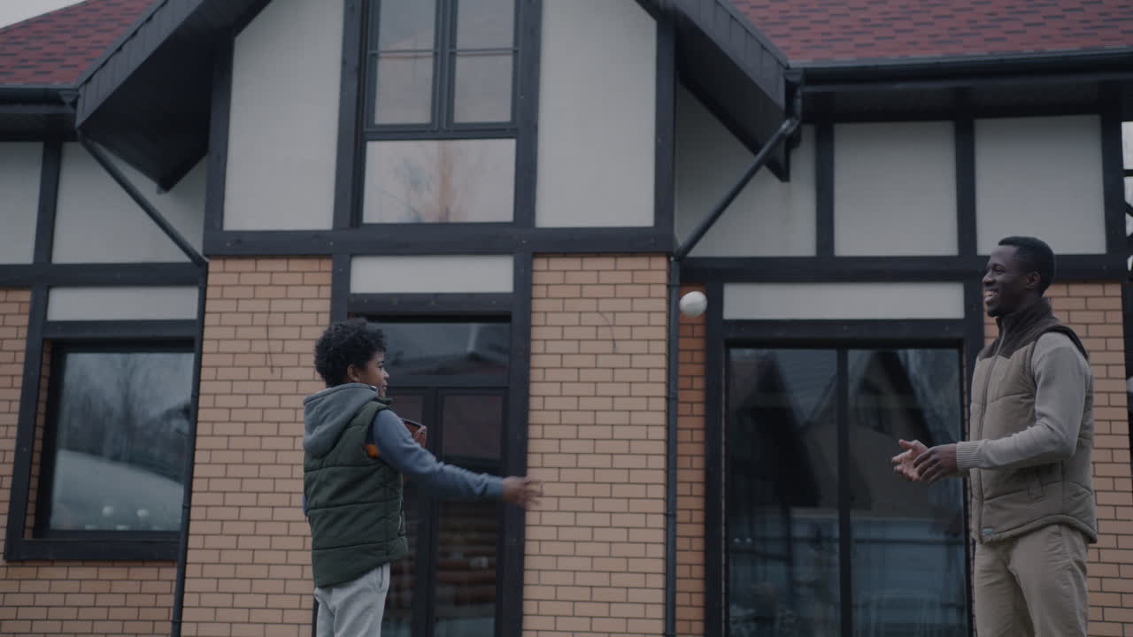 Father and Son Playing Baseball