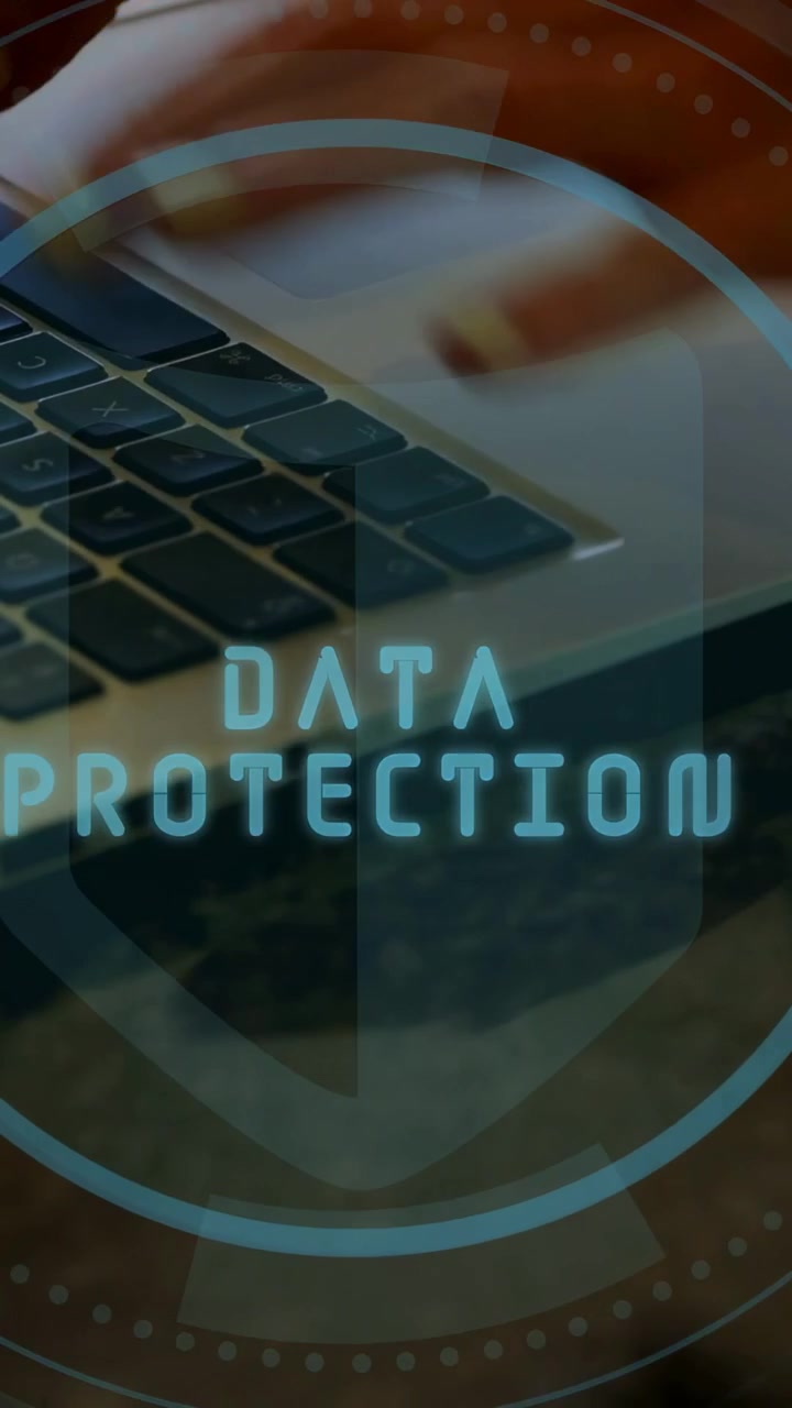 Vertical video: Hands hovering, DATA PROTECTION, HUD rings tracking fingers, typing securing data