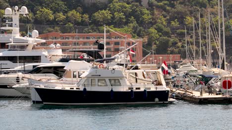 yachts and boats docked at monte carlo pier