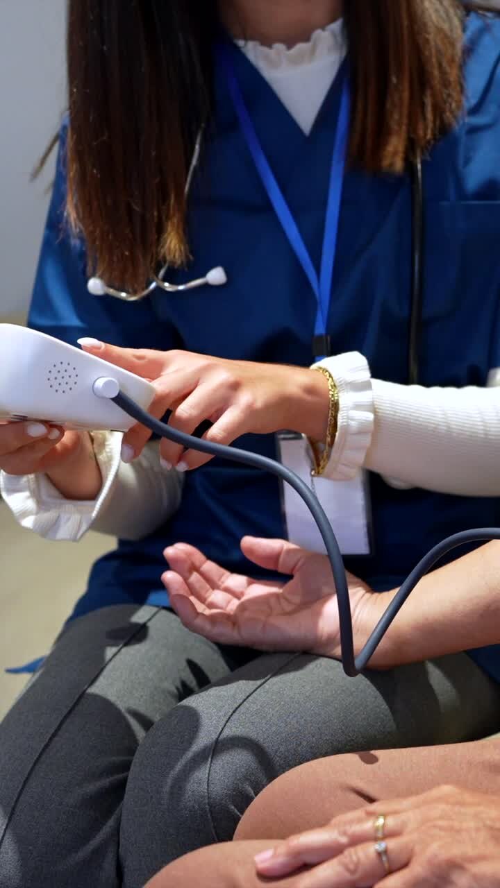 Doctor Checking Patient&#039;s Blood Pressure