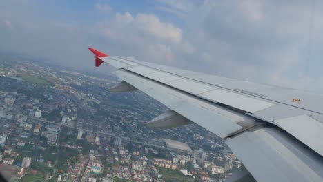 sky from airplane with wing fly over cloud in summer daytime