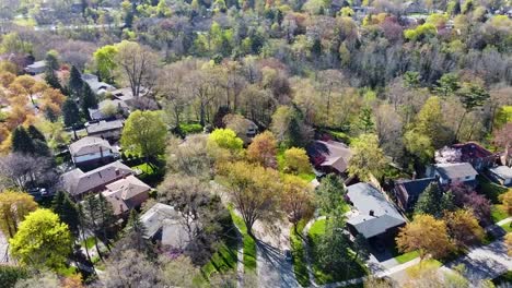 Aerial-view-circling-over-houses-on-a-fall-day-in-Mississauga