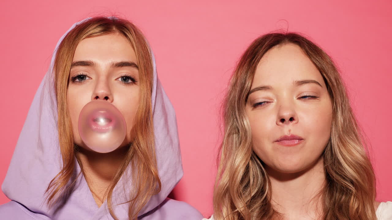 Two Friends Blowing Bubbles