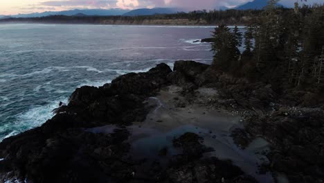 aerial drone sunset view of tofino coastline and ocean in british columbia