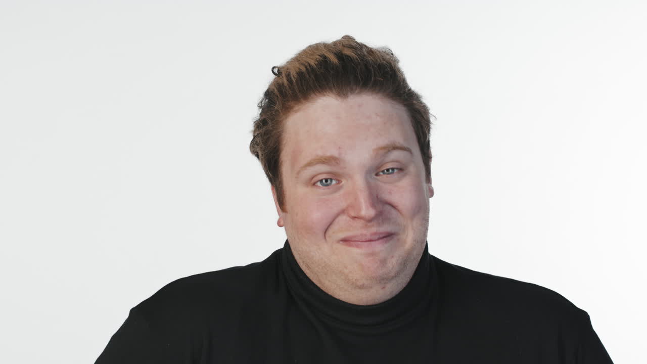 Man Laughing at Camera