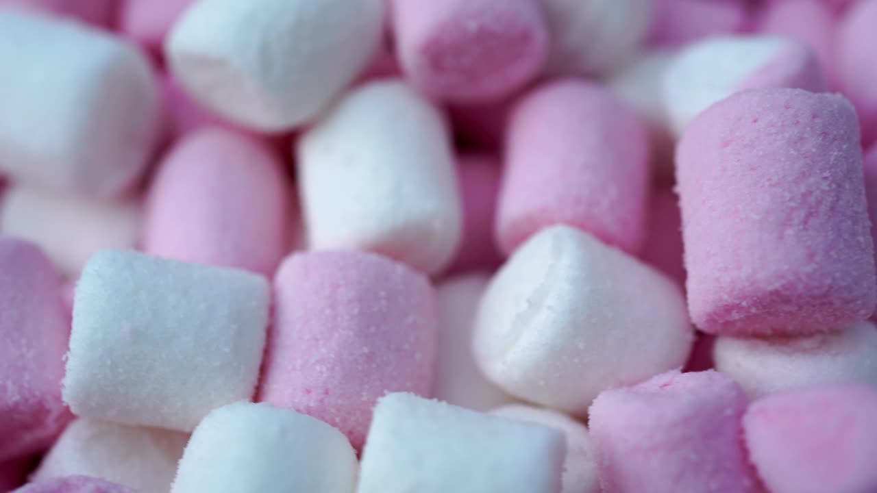 마쉬멜로 핑크와  사탕 배경 회전