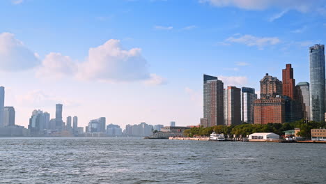 skyline of new york from the waterscape of the river. watching the metropolis during the river tour