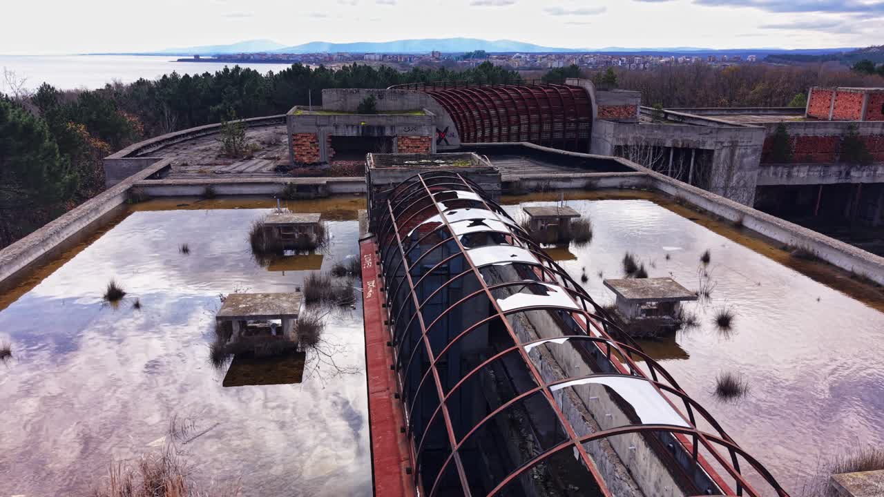 Exploring the abandoned structures near a serene waterfront