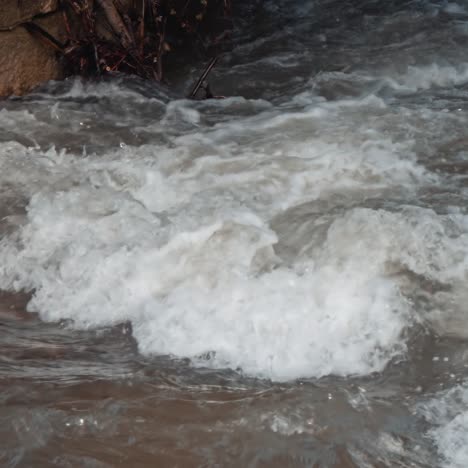 white mountain stream water falling down