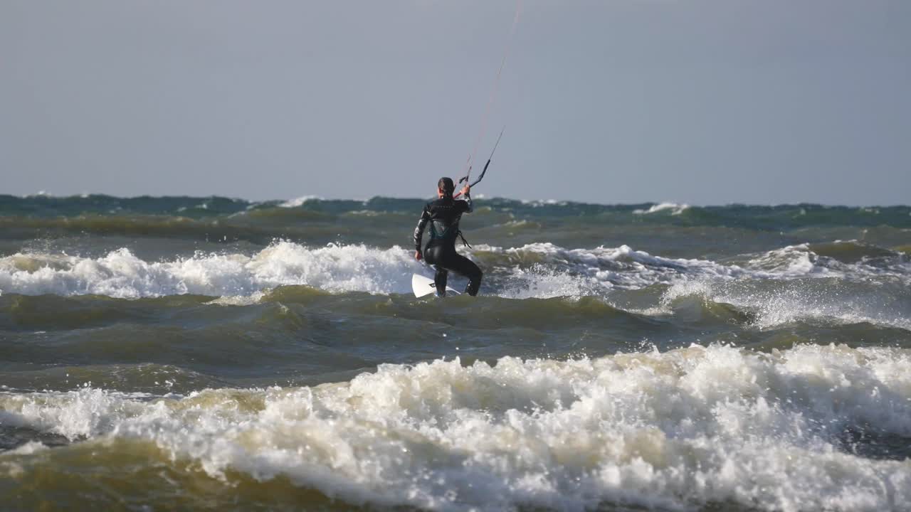 Kiteboarding on High Waves. Baltic Sea, Poland.
