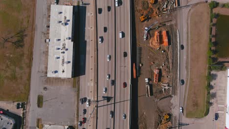 Aerial-of-cars-on-610-South-freeway-in-Houston,-Texas