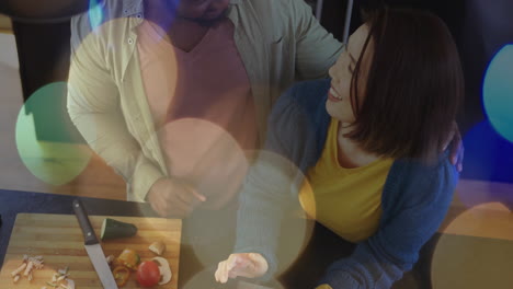 cooking together in kitchen, couple smiling over bokeh lights animation