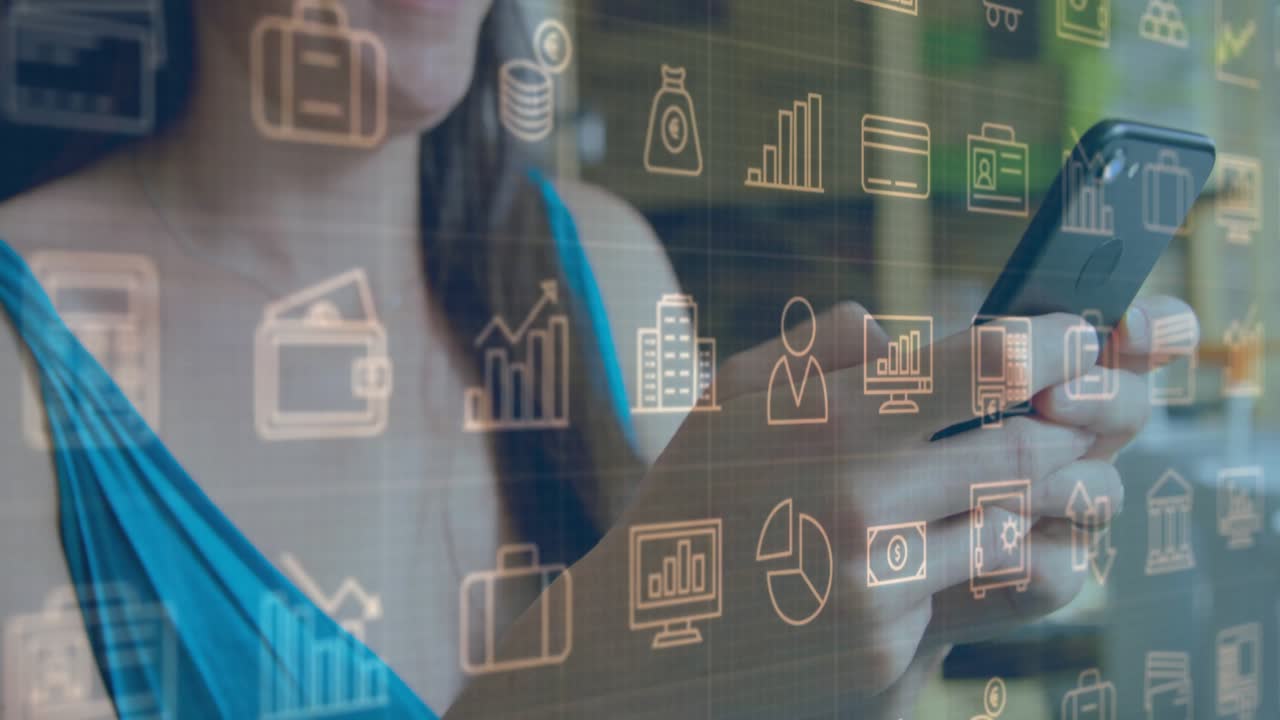 Man holding smartphone in home workspace, displaying floating finance charts, coins money bag icons