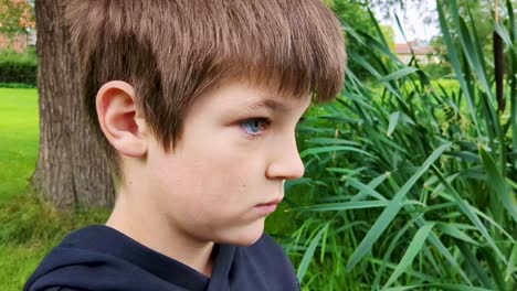 4K-60FPS-Close-Up-View-of-Boy-Fishing-in-Beautiful-City-Pond-Coarse-Fishing---Panoramic-Shot