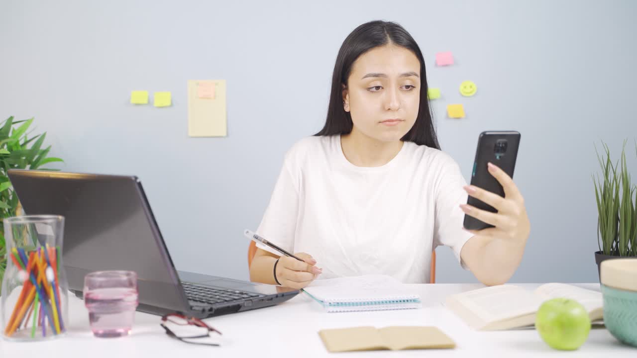 Female student Video Calling about lessons.