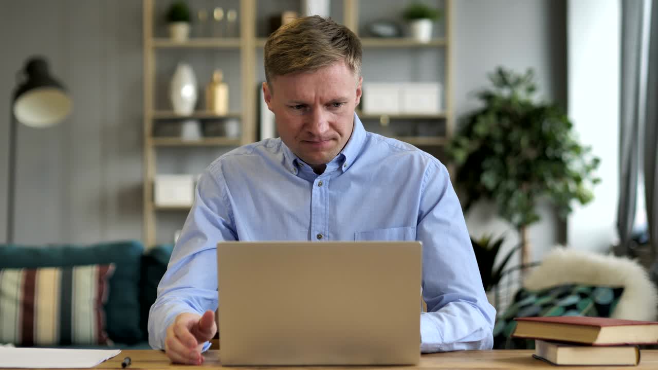Angry Businessman Reacting to Loss at Work