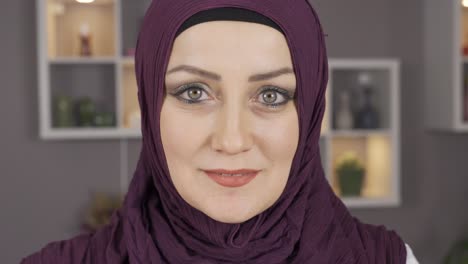 close-up portrait of woman in hijab.