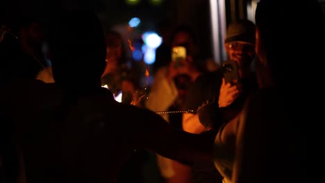 performers entertain with fire tricks at night