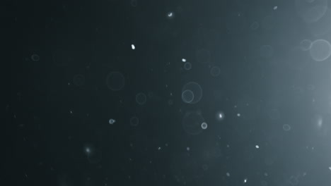 floating abstract particle bokeh on dark background