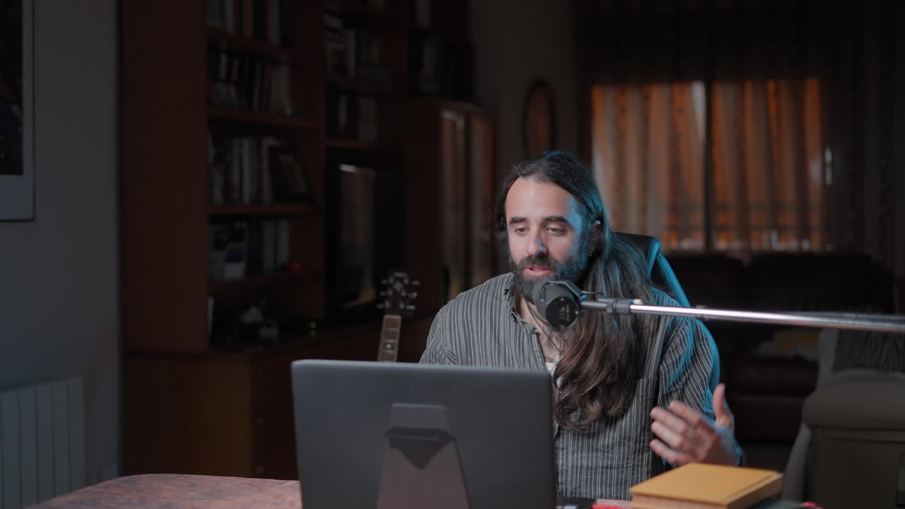 Man Recording Podcast/Video at Home