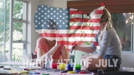 Independence-text-and-american-flag-over-us-map-against-caucasian-mother-and-daughter-high-fiving