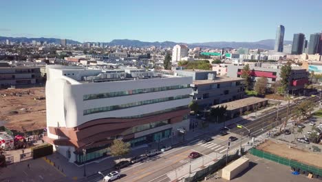 Panning-aerial-shot-of-South-Grand-Avenue-with-Downtown-Los-Angeles-in-the-background