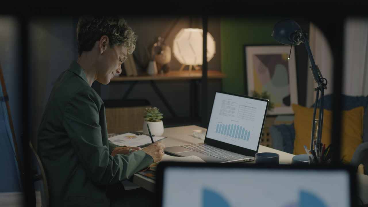 Businesswoman Working Late at Home