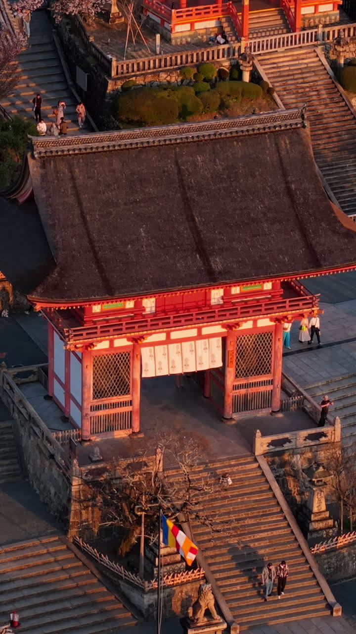 Aerial drone view of the Kiyomizu-dera temple at sunset in Kyoto, Japan