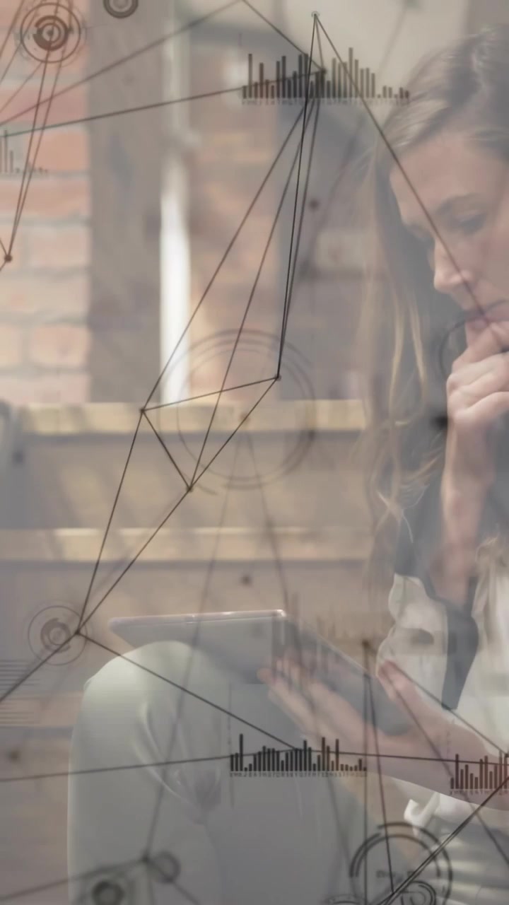 Vertical video: Woman tapping tablet in lounge, activating network overlay for data insights