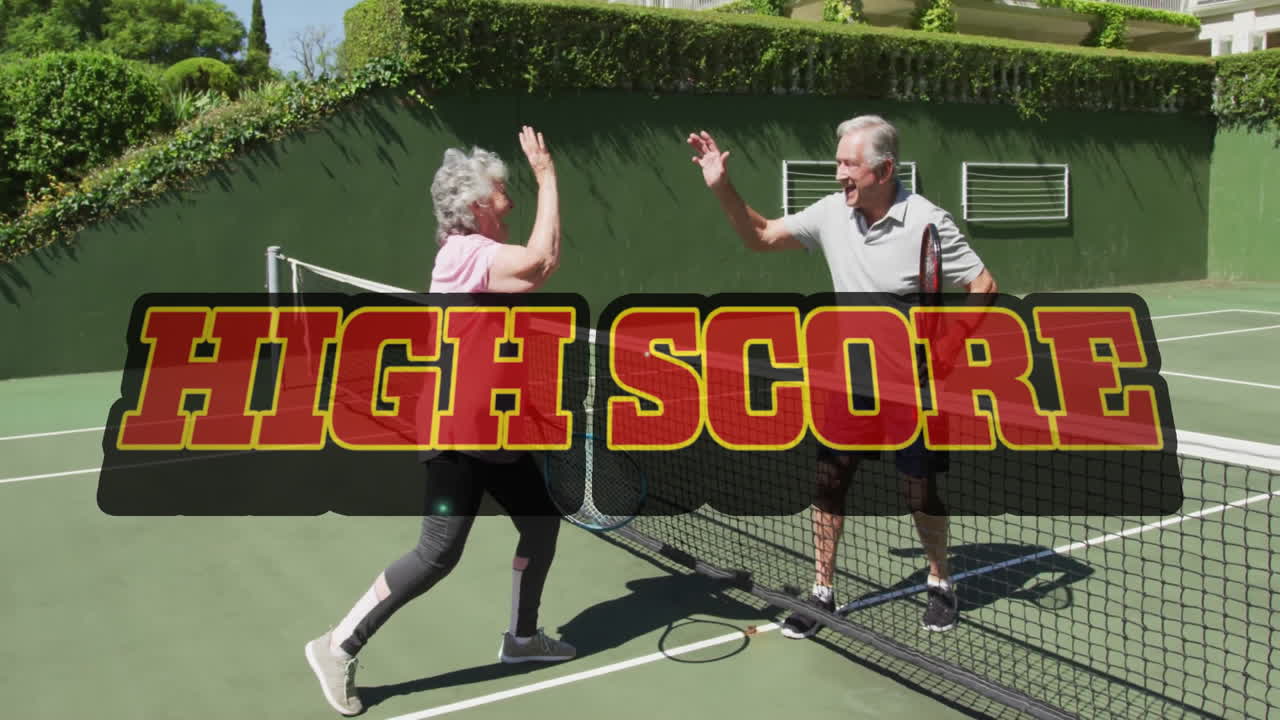 Senior couple celebrating point on private tennis court, with animated fitness chart and scoreboard