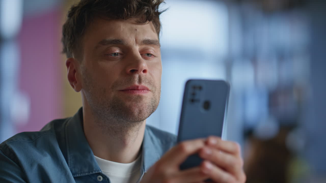 Man hand holding smartphone enjoying break cabinet closeup. Relaxed office guy