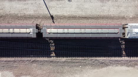 top-down aerial footage view from drone of train