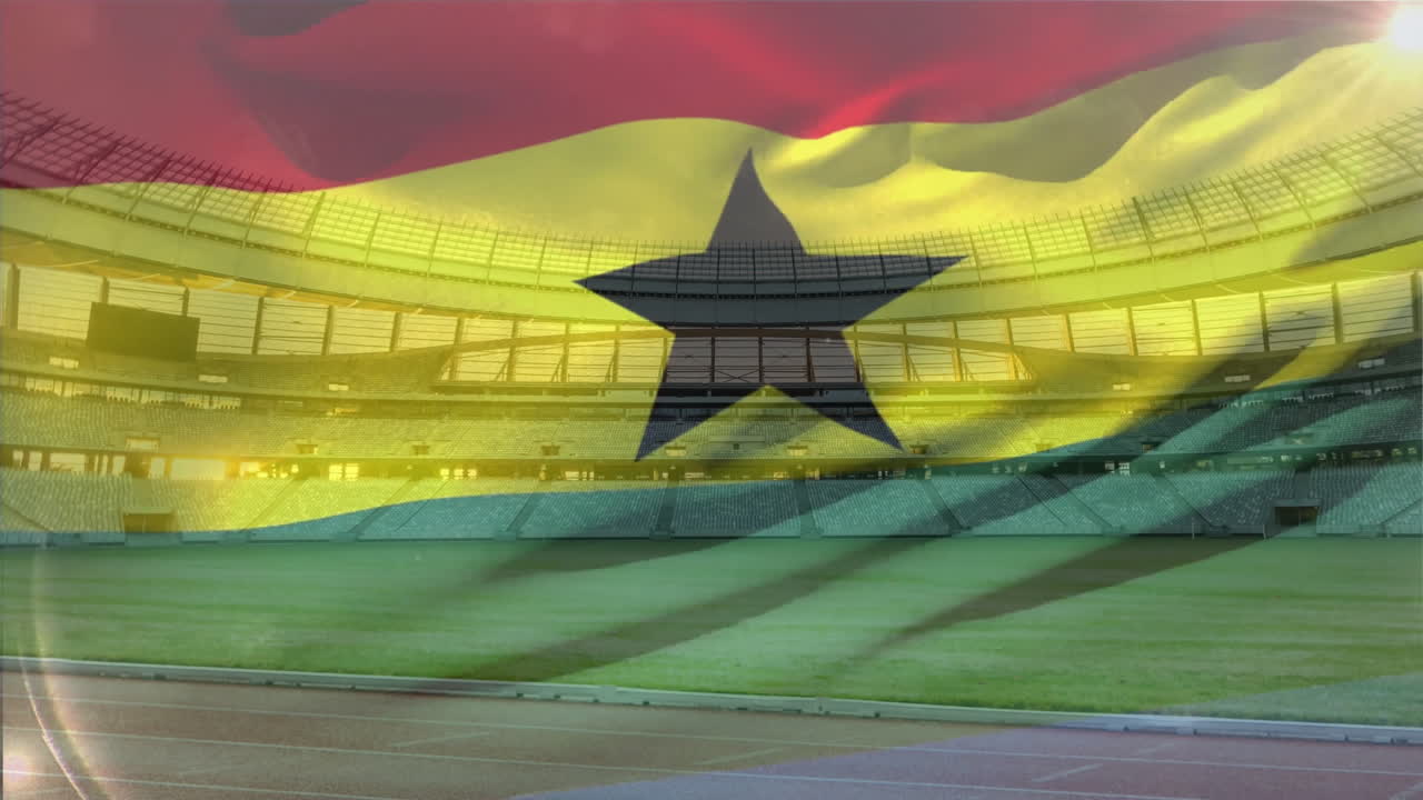 Animazione della bandiera del Ghana sopra uno stadio vuoto con campo verde e pista.