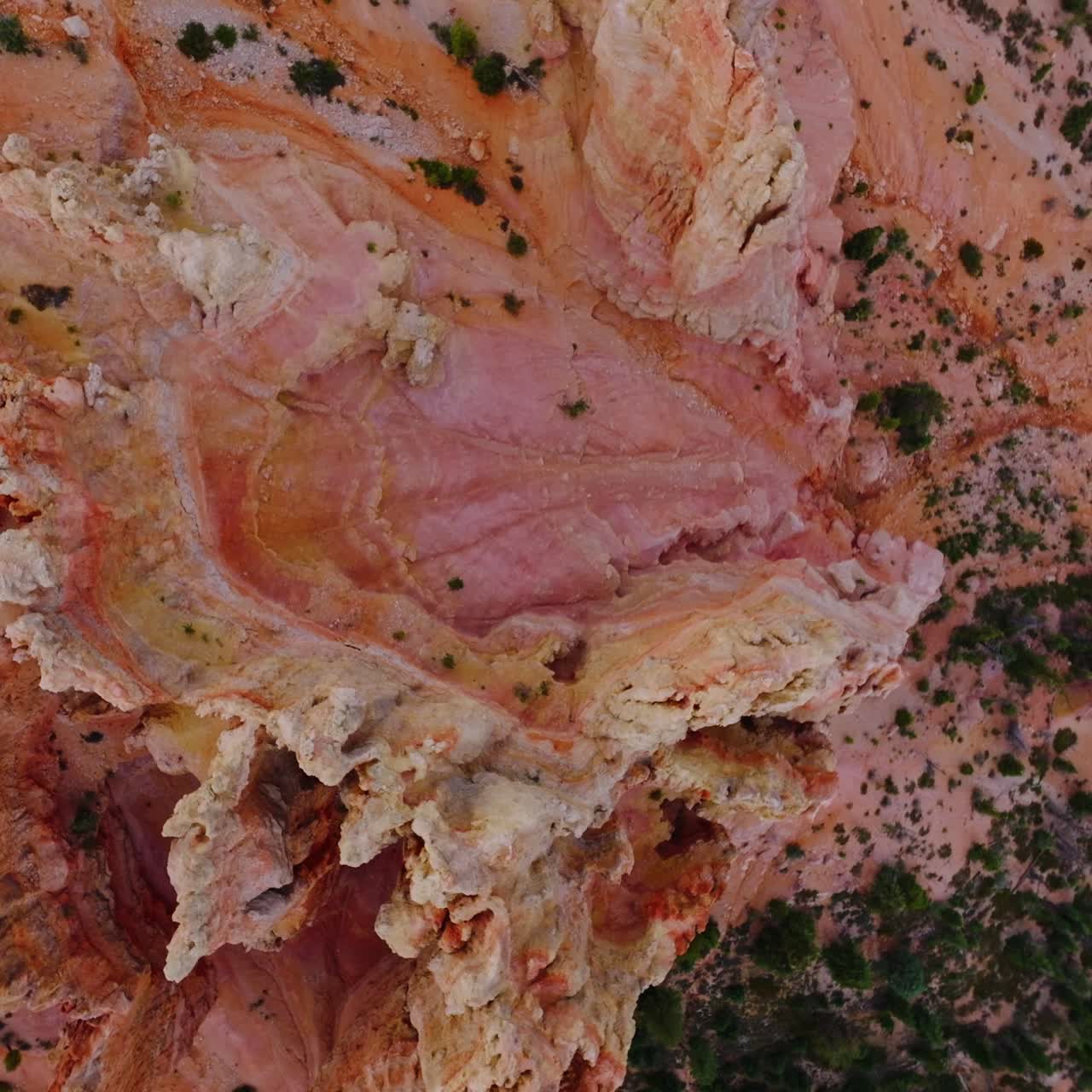 Amazingly shaped rocks of beautiful coral color. Bryce National Park canyons from top view at daytime