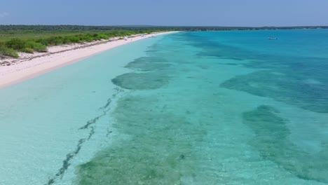 aerial forward panorama exotic white sand beach paradise in the caribbean