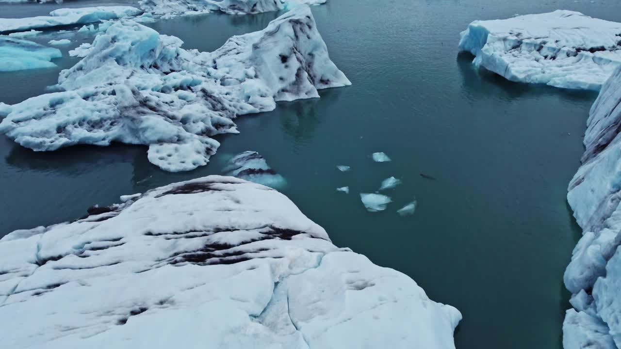 Drone shot of iceberg at J&ouml;kuls&aacute;rl&oacute;n Iceland in summer