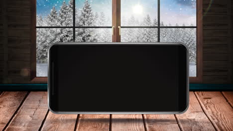 animación de una pantalla en blanco de un teléfono inteligente con un paisaje de invierno visto a través de una ventana en el fondo