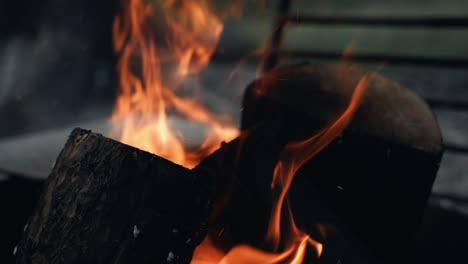 closeup view of fire flames from burning woods at banff national park in alberta, canada - slowmo