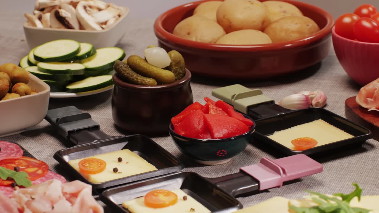 Italian or Spanish restaurant with traditional tapas food, Spanish cuisine, delicious tapas and cheese plate, bruschetta with cheese, olives dry tomatoes and tasty sandwich bar appetizer, buffet