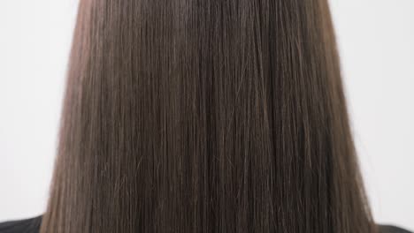 demonstration of smooth and silky hair after straightening it with a steampod