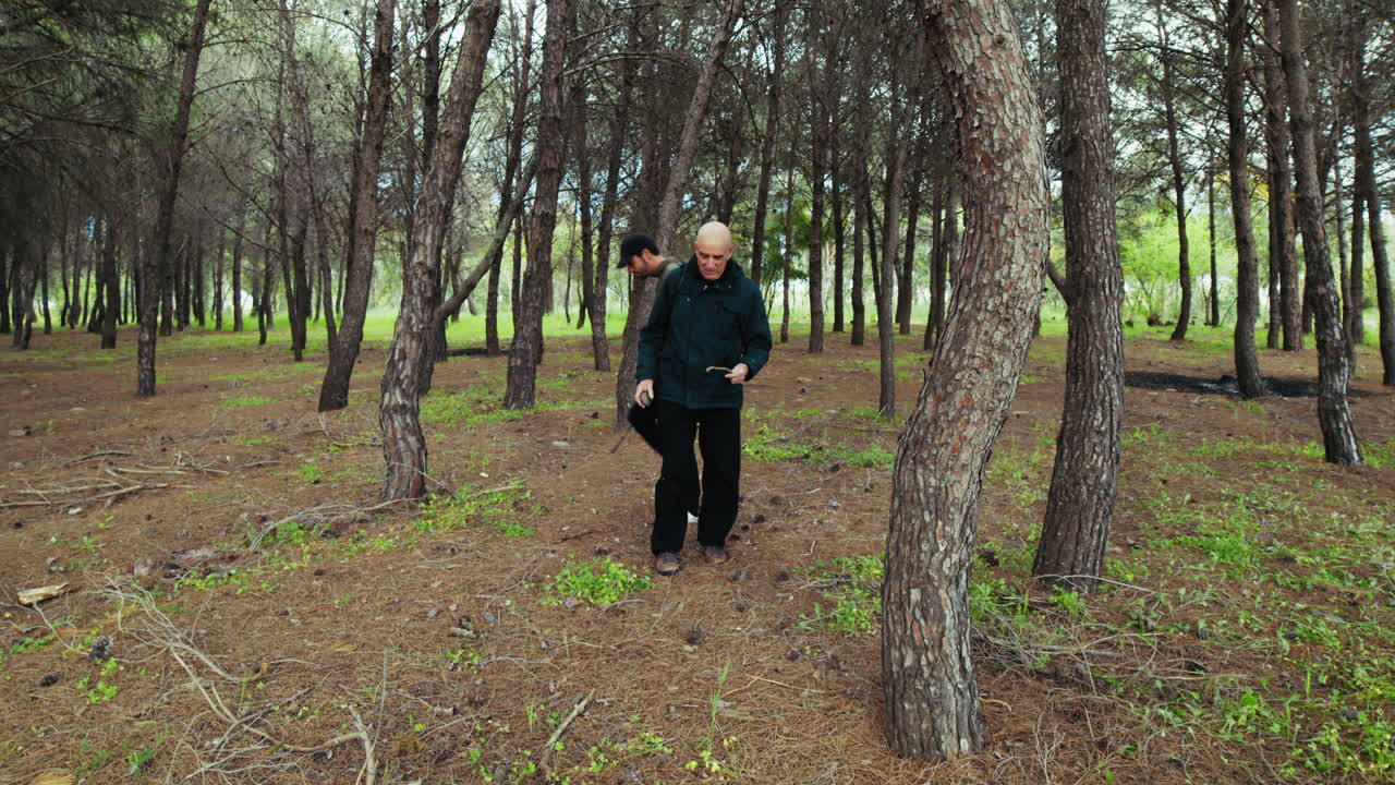 Two Men Walking in the Natural Woods of Italy